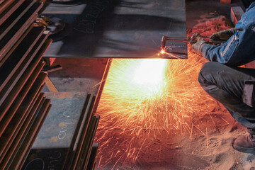 Cutting steel plate.