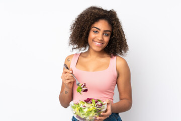 Young  African American woman with salad isolated on white background