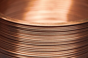 Close-up flat twisted copper wire at a factory