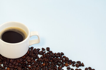 Cup of coffee, espresso on a white background with coffee beans.