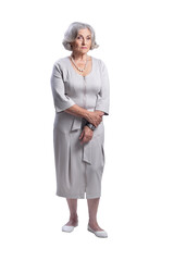 Beautiful sad senior woman against white background