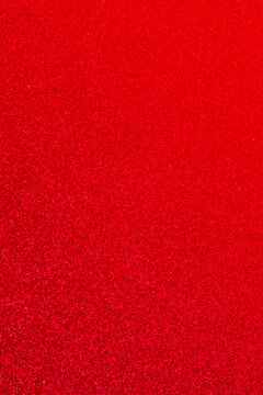 Red  lights background  for Valentines Day and Christmas greeting Card.  Defocused abstract red sparkles with gradient