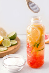 Collagen and citrus drink on a white background