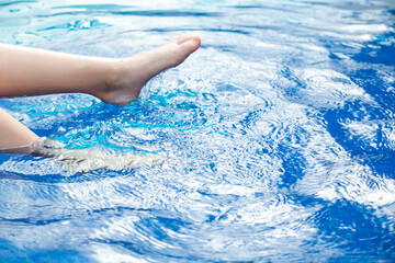 image of swimming pool children foot 