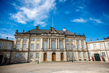 Fototapeta premium Royal Guard, Den Kongelige Livgarde, during Honor Guard Change Ceremony at Royal Amalienborg Palace in Copenhagen, Denmark. 