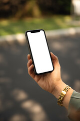  woman's hand holding cell phone