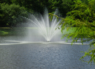 Fountain Spray on pond in Carl Barton Jr. Park in Conroe, TX.