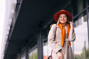 Beautiful fashion model in hat. Stylish cute girl in fashion clothes.
