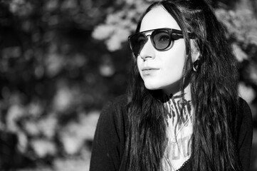 portrait of a young woman in sunglasses