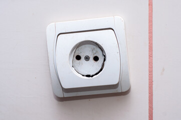 Broken housing; plastic wall sockets; cracked socket with crack