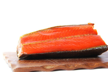A piece of red fish on a white background. Raw red fish. Seafood