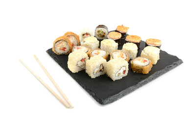 baked sushi in assortment on a stone for serving dishes, white isolated background, horizontal view