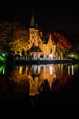 Reflections on Minnewater in Brugge, Belgium