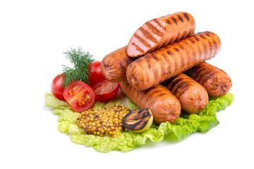 delicious grilled sausages,cherry tomatoes,dill, fried garlic, mustard sauce on a lettuce leaf, close-up, isolated white background