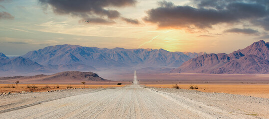 Gravel road and beautiful landscape in Namibia - obrazy, fototapety, plakaty