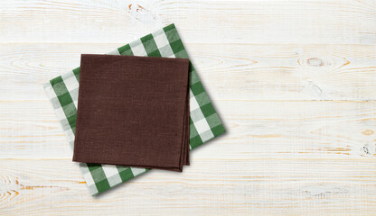 Napkin. Stack of colorful dish towels on white desk