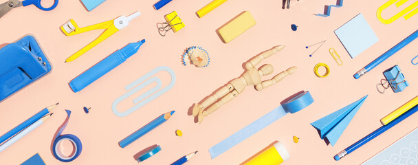 Set of school supplies on pink background. Back to school banner.