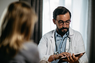 portrait of a doctor during a patient consultation