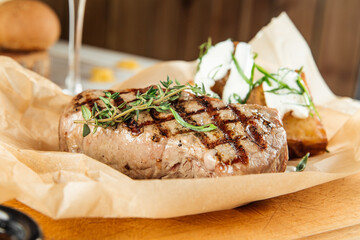 New york beef steak baked potatoes  sour cream