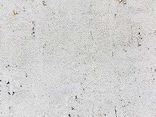 Creative background of rusty metal with cracks and scratches, casually painted white. Grungy metal surface. Great background or texture for your project.