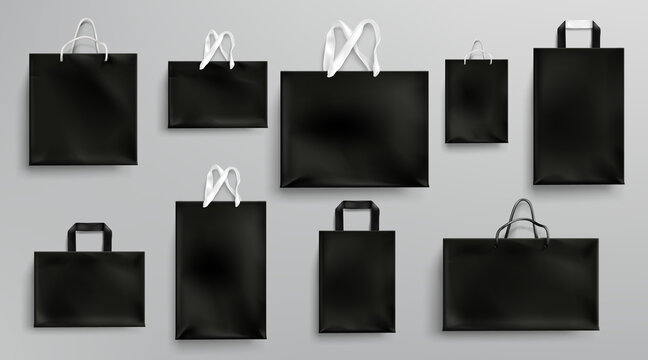 Paper shopping bags mockup, black packages with rope and lace handles, blank rectangular ecological gift packs, isolated mock up for branding and corporate identity design, Realistic 3d vector set