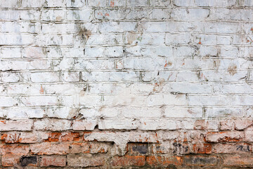 Abstract background old white brick wall with cracks and scratches. Landscape style. Great background or texture.