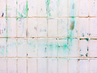 Abstract background old white brick wall with cracks and scratches. Landscape style. Great background or texture.