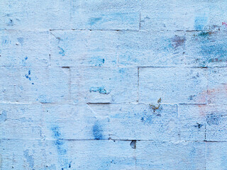 Abstract background old white brick wall with cracks and scratches. Landscape style. Great background or texture.