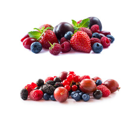 Fruits, berries isolated on white background. Currant, blueberry, strawberry, plum, gooseberry, mulberry, raspberry. Mixed berries isolated on white background.Berries close-up