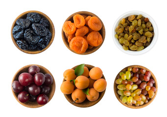 Raisins, grapes, dried apricots, apricots, dried prune and plums isolated on white background. Collage of fresh fruits, dried fruits. Top view. Dried fruits and fresh fruits with copy space for text.