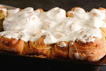 Sweet tasty homemade rose buns rolls with sugar whipped cream, hot and fresh, bakery for recipe book, angle view