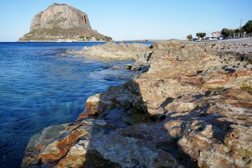coastline with Monemvasia in Greece in the distance