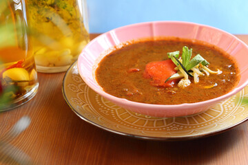 Soup with roasted vegetables. 
Appetizing dish. Suggestion of serving a dish. Culinary photography.