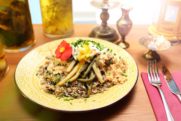 Mutton meatballs with porridge and green beans. Traditional Jewish cuisine.
Appetizing dish. Suggestion of serving a dish. Culinary Photography.