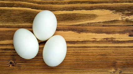 Duck egg on a wooden table.