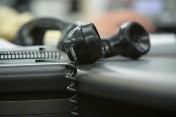 close-up of telephone receiver on table at office