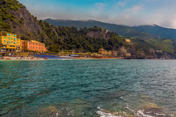 A view from the sea wall towards the beach at Monterosso al Mare, Italy in summer