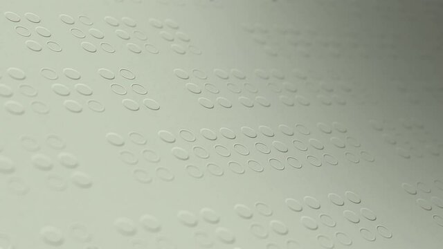 paper with braille text. the text is the well known 'lorem ipsum' (3d render)