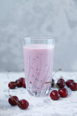 healthy summer sweet pink smoothie with cherries