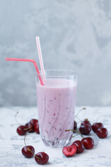 healthy summer sweet pink smoothie with cherries