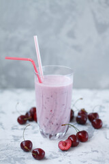healthy summer sweet pink smoothie with cherries