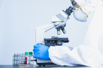 Doctors wear a face shield / PPE for protection against coronavirus disease. The doctor works...