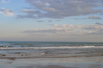 Winter beach sunset with endless horizon
