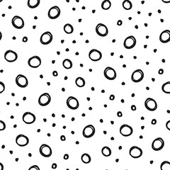 Hand drawn circles seamless pattern. Random dots loop texture background.