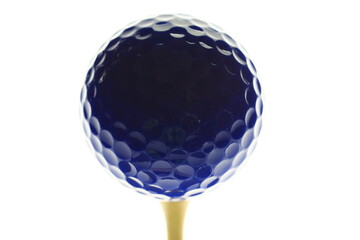 Dark blue golf ball ready to be hit