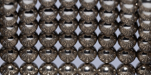 Shiny magnetic silver  ball orb light reflections
