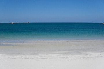white sand beach and blue turquoise sea
