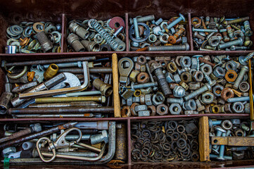 nut screws and nails iron rusty old close-up