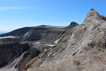 View from the edge of a crater to the top (1829 m) of Gorely volcano, Kamchatka Peninsula, Far East Russia