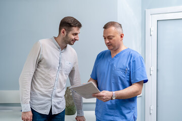Fototapeta premium Patient is in the doctor's office. Man receives prescription medicine. Realistic images. Selective focus